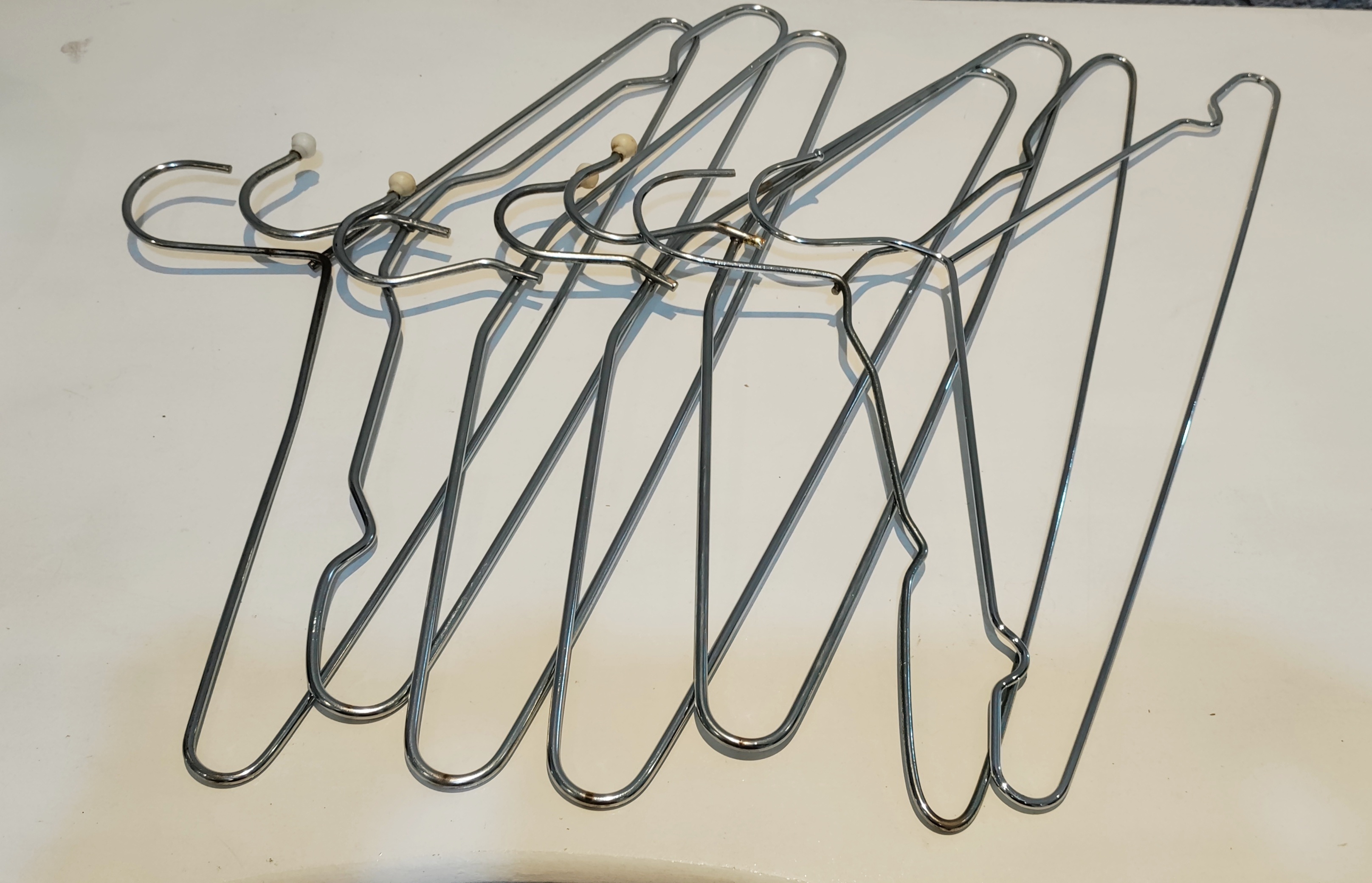 Kit 7 Cabides de aço cromado